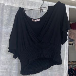 Black cropped plunge neck shirt with ruched bottom